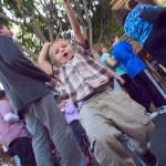 A little boy excited to be at disneyland